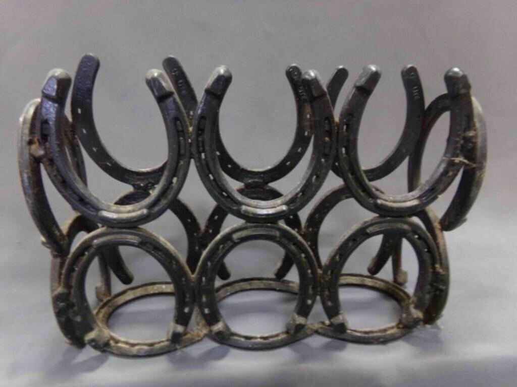 Welded Horseshoe Magazine Rack ??