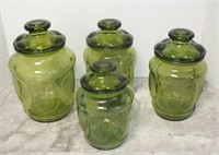 4 GREEN GLASS COVERED JARS