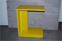 ABSTRACT PRESSED WOOD YELLOW TABLE ON WHEELS
