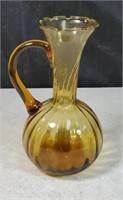 Glass amber pitcher approx 7 inches tall