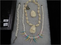 19" carved bone necklace with elephant and