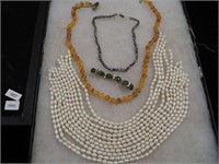 11 strands of unstrung freshwater pearls, necklace