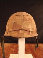 US army helmet with camo cover