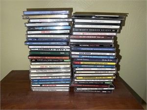 2 stacks of CDs, various Artists & genres