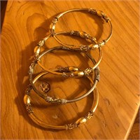 (3) Gold Tone (1) Silver Tone Bangle Bracelets