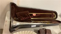 Vintage king silver tone, trombone, and case