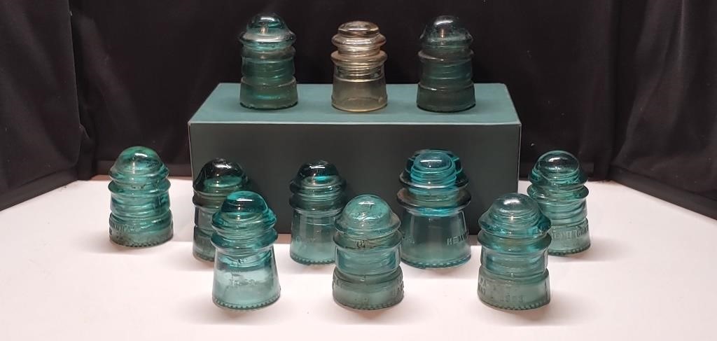 Lot of 11 glass insulators.