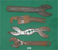 Four rusty wrenches