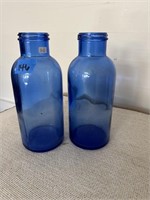 2 Blue Bottles