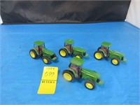 Four John Deere Tractors