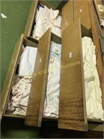 Four drawers of assorted bed linens