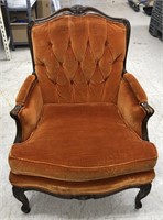 Orange velour and wood arm chair, with armrest