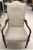 High back arm chair with carved wooden legs