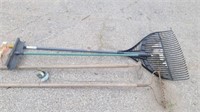 2 rakes, hoe, and other yard tools