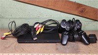 PS2 console with controllers and cords Untested