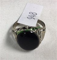 Silver ring with black stone, can't read mark,
