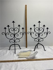 2 Metal candelabras with candles