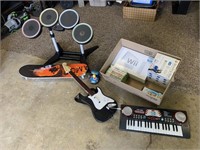 LOT OF WII KEYBOARD/ACCESSORIES GUITAR ETC