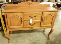 Lot #518 - Oak two drawer two door Queen Anne