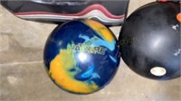 Two Bowling Balls: One Men’s Roto Grip, One Men’s