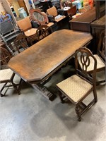 Table with 5 cloth chairs