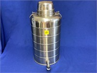 Stainless steel drink cooler with spout.