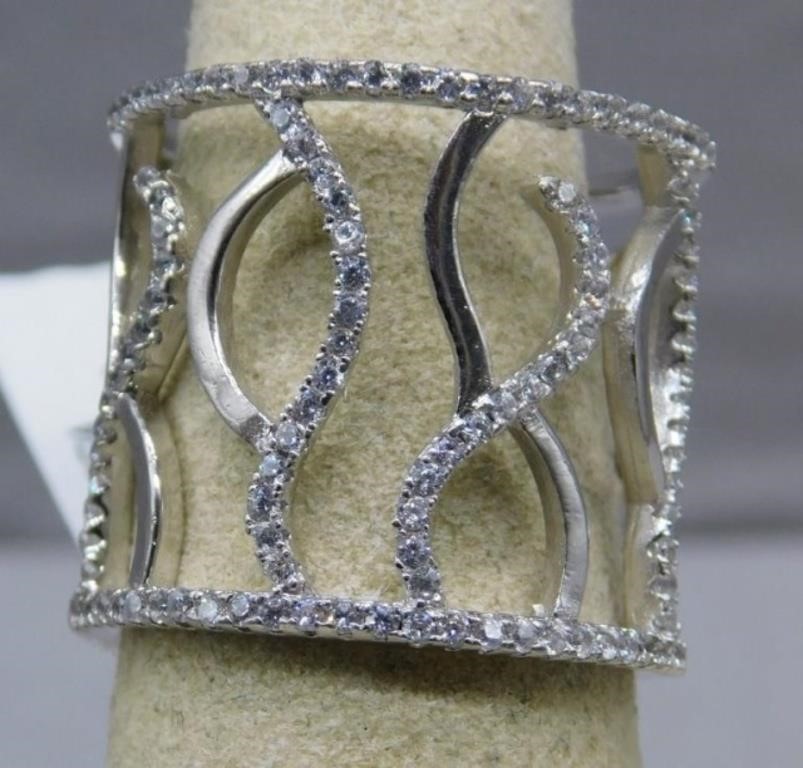 Sterling Silver ring with CZ stones, size 7.