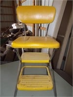 Yellow metal step stool