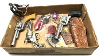 Lot: Assorted vintage Toy Guns, holsters, spurs