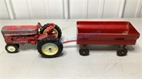 ERTL INTERNATIONAL TRACTOR WITH A METAL