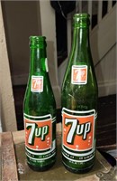 Pair of vintage 7up bottles