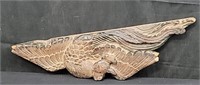 Antique wood carving wall decoration of a bird