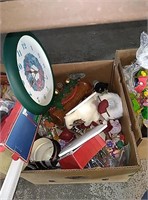 Box of Christmas decor, clock, and more