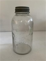 Antique ball mason jar with original lid filled