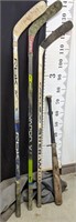 3 Hockey Sticks, 1 bat and storage bag 54"-58"
