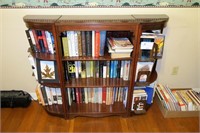 3 piece book shelf with over 100 books