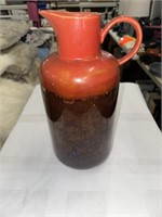 LARGE RED AND BROWN DECORATIVE PITCHER