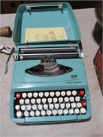 VINTAGE AQUA SMITH-CARONA TYPEWRITER