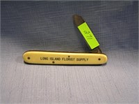 Antique celluloid advertising pocket knife