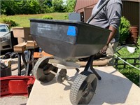 ROLLING SEEDER AND FERTILIZER