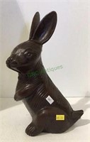 Cast iron rabbit measuring 11 inches tall.   1441
