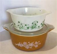 Vintage Pyrex includes two bowls - one with a