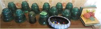 Glass electric insulators, bookends, marbles