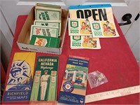 Couple old maps, green stamp books full
