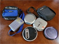 Assorted CD Walkmans, Storage, and Lights Out Game