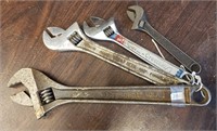 Lot of Four Different Sized Adjustable Wrenches