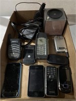 Lot with cell phone, Garmin, and GE radio