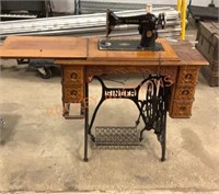 Antique singer, sewing machine with stand