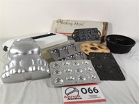 Lot of metal baking molds and pans; cake carrier