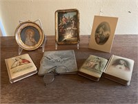 Collection of religious items/antique eye glasses